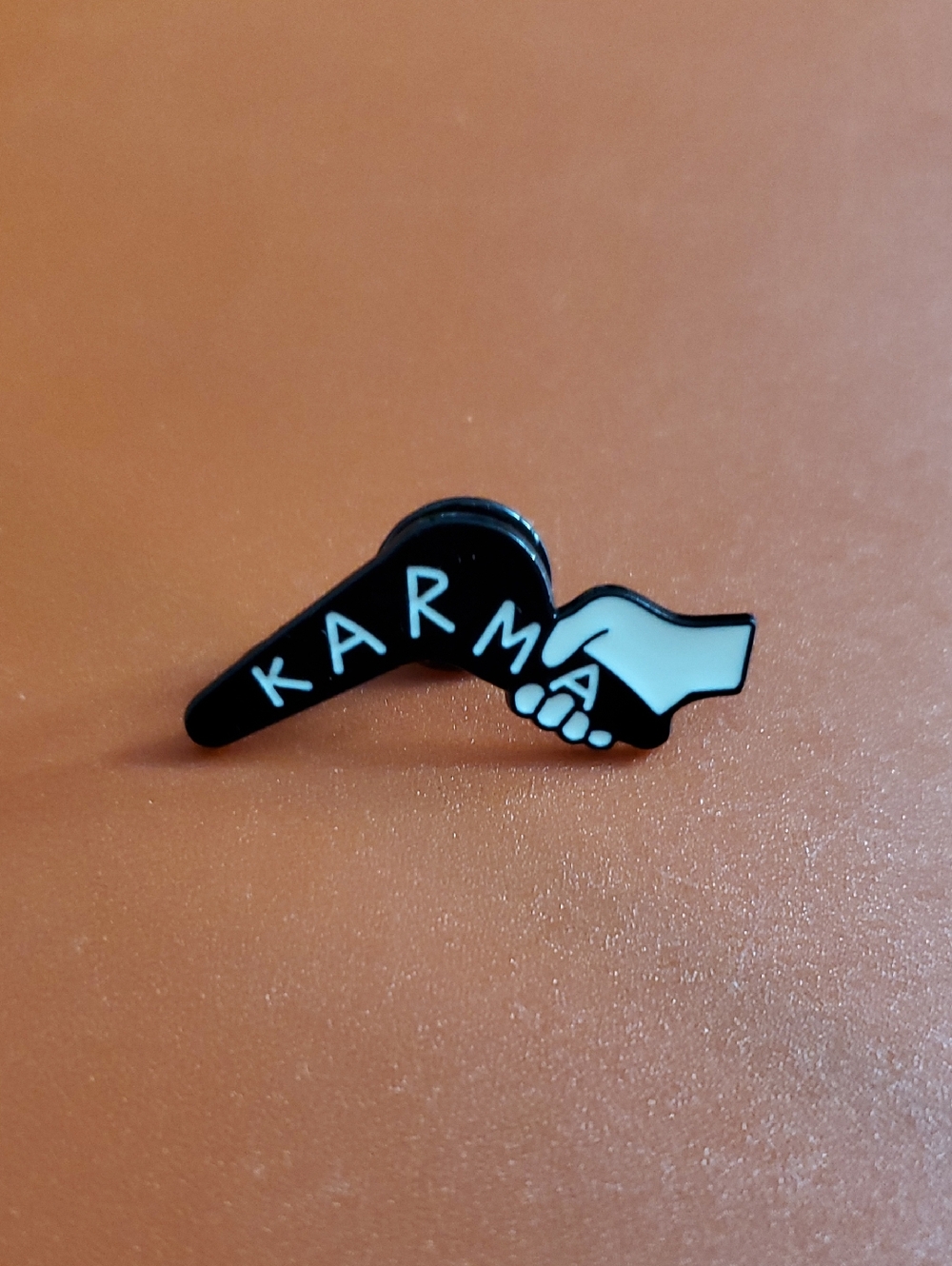 Karma Boomerang Hand Enamel Pin in Black and White